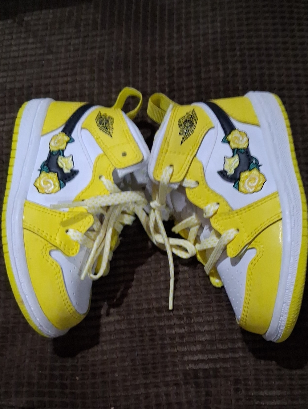 Kids Jordans Yellow and White High-Top Sneakers with Floral Accent